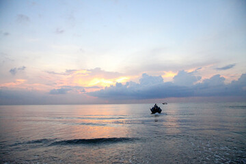 fishing at sunset