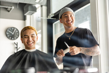 Barber And Client Laugh Together