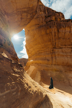 Man wearing a abaya in the desert