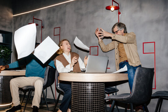 Man explaining data to colleagues