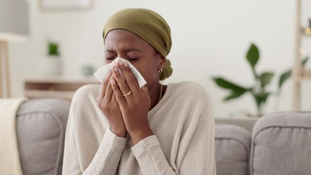 Black woman, tissue and sneeze, sick and health with cold or flu, illness and virus at home, allergy and hay fever. Sinus problem, blowing nose and healthcare with female in living room with disease
