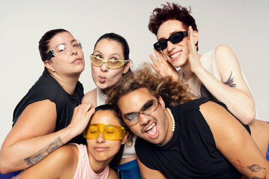 Happy young adult group of friends youth culture concept