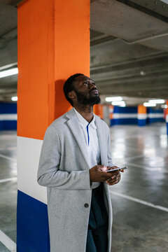 Black man thinking over message