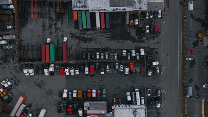 overhead aerial view, cargo terminal in a port. trucks and containers