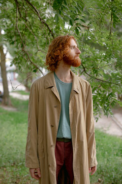 
red-haired young man with a beard
