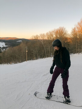 UGC of teen girl on  snowboard 