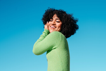 Smiling and confident trans woman