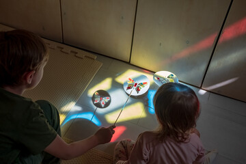 light therapy : boy plays with light