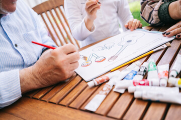 Crop family coloring drawing with acrylic paints