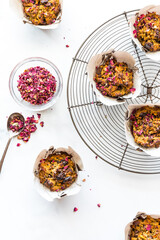 Morning Glory muffins on a vintage cooling rack, garnished with rose petals.