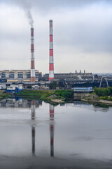 View of the Tom River and the Cox-Chemical Plant in the city of Kemerovo in fog