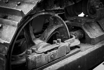 A fragment of the transmission of the wheel moving the caterpillar of a bulldozer tractor weighing...
