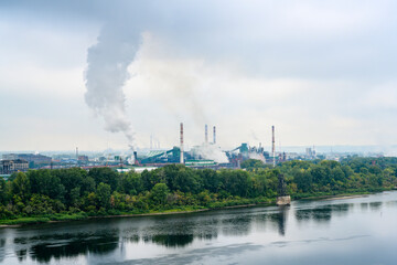View of the Tom River and the Cox-Chemical Plant in the city of Kemerovo in fog