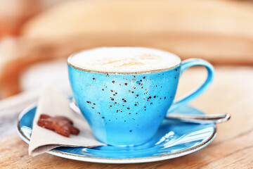 a cup of coffee in a cafe, photo morning coffee luvak cappuccino