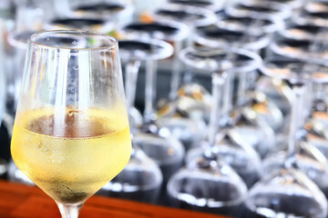 white wine tasting, chilled ice wine in a cold glass in summer