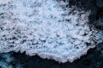 sea waves foam drone view abstract background ocean top