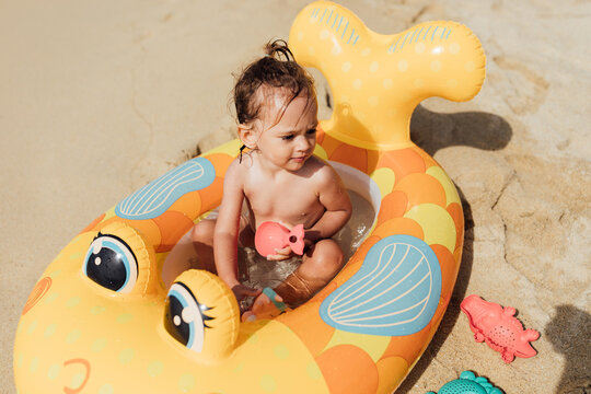 Baby girl in Float Boat