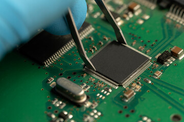 CPU chip on motherboard - with microcircuits and other computer parts