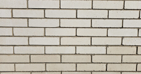 grey brick wall, abstract background texture.