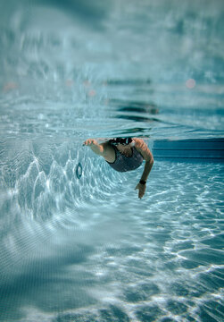 Woman Swimming Laps 