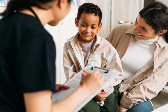 Little Boy with Mother on Checkup