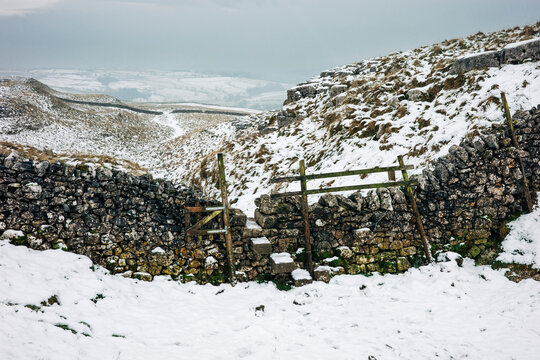 Snow and wall stile near Malham Cove