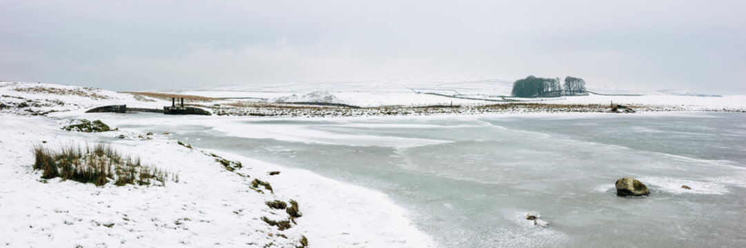 remote lake frozen in winter