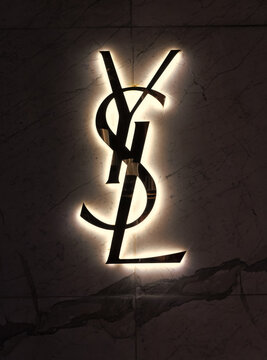Miami, USA - March 20, 2021: lighted YSL logo trademark on shop wall at Design District in Florida