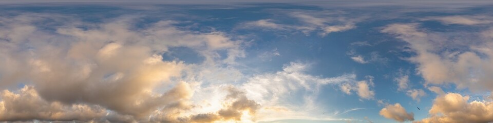 360 sky panorama of vibrant golden Cumulus clouds at sunset, seamless hdr equirectangular format. Full zenith for 3D visualization and sky replacement