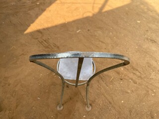 A sleek metallic chair shot from top angle 