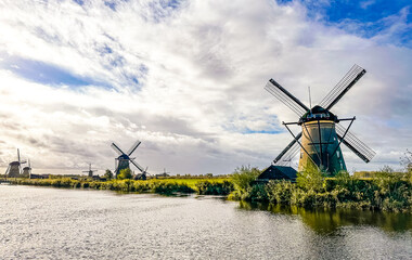 Fototapeta premium Kinderdijk windmills and water canal in Netherlands, Europe