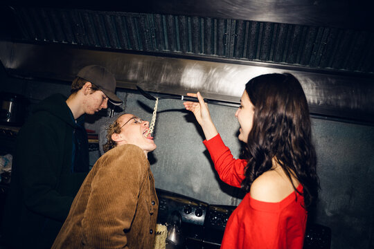 UGC  young people messing around  while cooking ramen noodles
