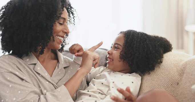 Happy, Nose Or Playful With A Mother And Daughter Bonding On A Sofa In The Living Room Of Their Home. Family, Love Or Laughing And A Woman Playing With Her Girl Child While In A House Together