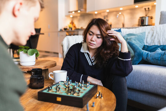 Friends playing chess