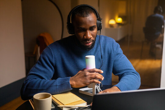 Podcaster records at home