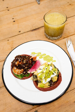 Two colorful sopes on a plate