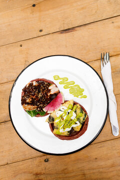 Two colorful sopes on a plate