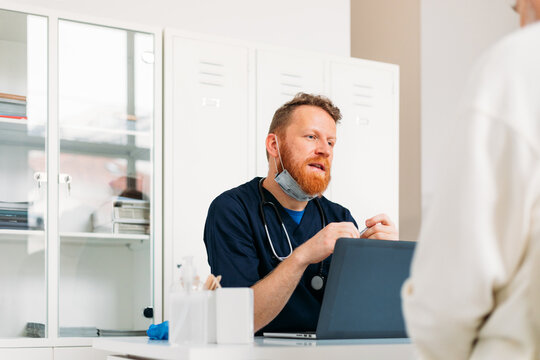 Doctor Examining Senior Man 