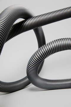 Vacuum cleaner on a grey background