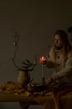 a woman prepares the Easter table