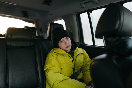 Bored Boy In Car.