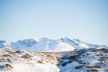 Fototapeta na wymiar Snowy mountain ridge on Isle of Skye in Scottish Highlands