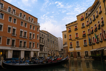 Canal with gondola and buildings in Venice, Italy
