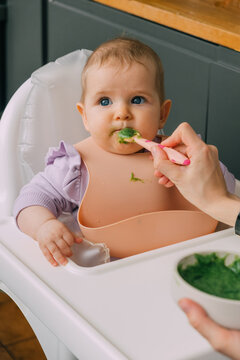 Introducing solid food to baby