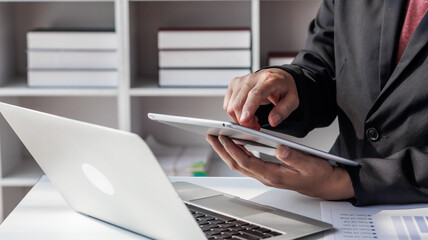 Businessman, financial auditor and secretary doing balance calculation report The Revenue Department checks the documents. Audit concept