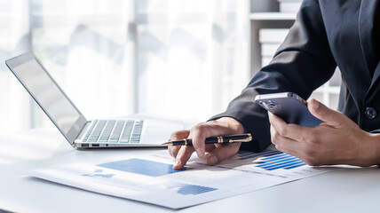 Businessman, financial auditor and secretary doing balance calculation report The Revenue...