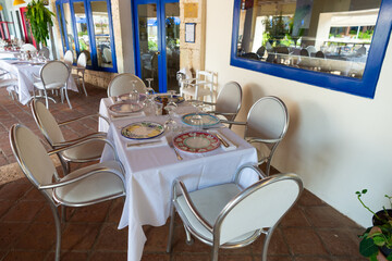 bistro terrace outdoor. bistro terrace with teble setting. empty bistro terrace.