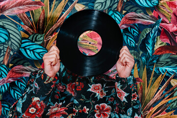 man covering his head with a disc