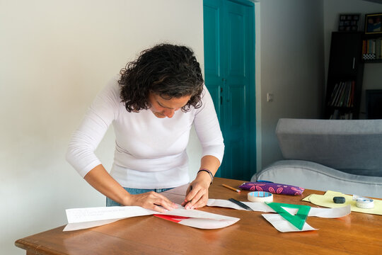 Designer making paper molds