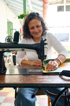 Portrait of a smiling dressmaker
